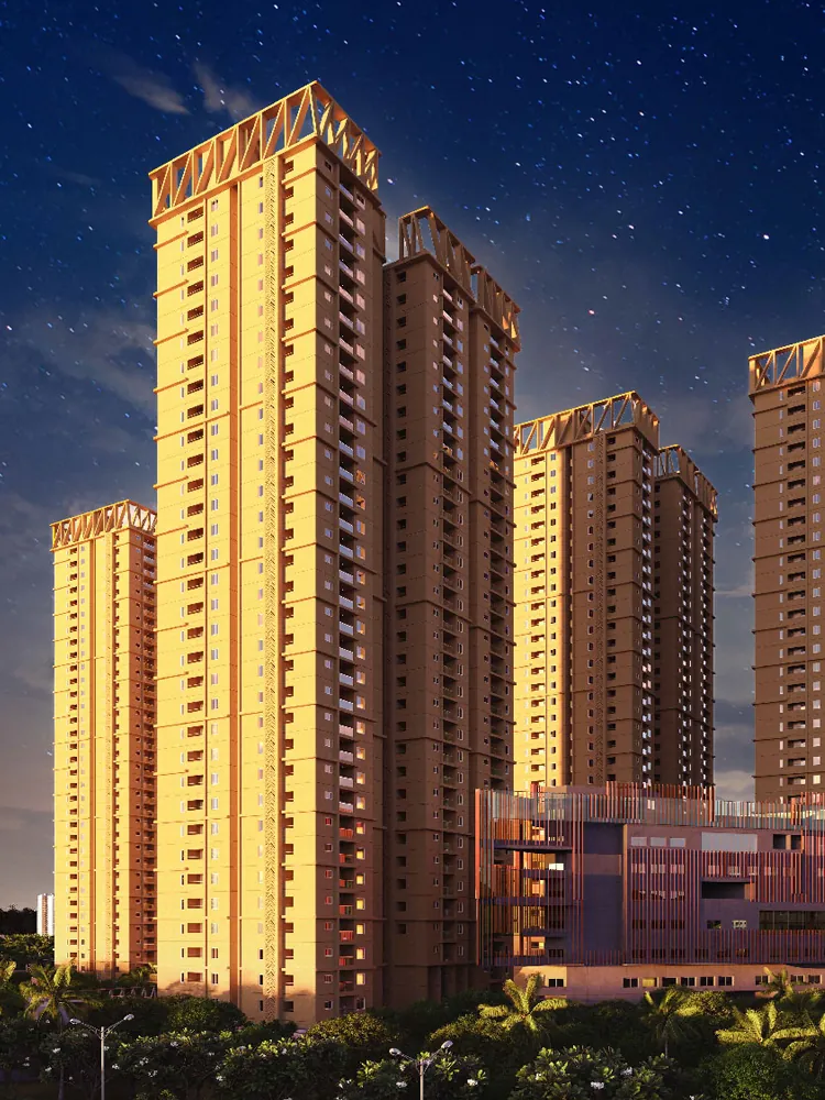 Altitudes by DSR, Osman Nagar, artistic impression Tall golden apartment towers above the trees at Altitudes by DSR, at night